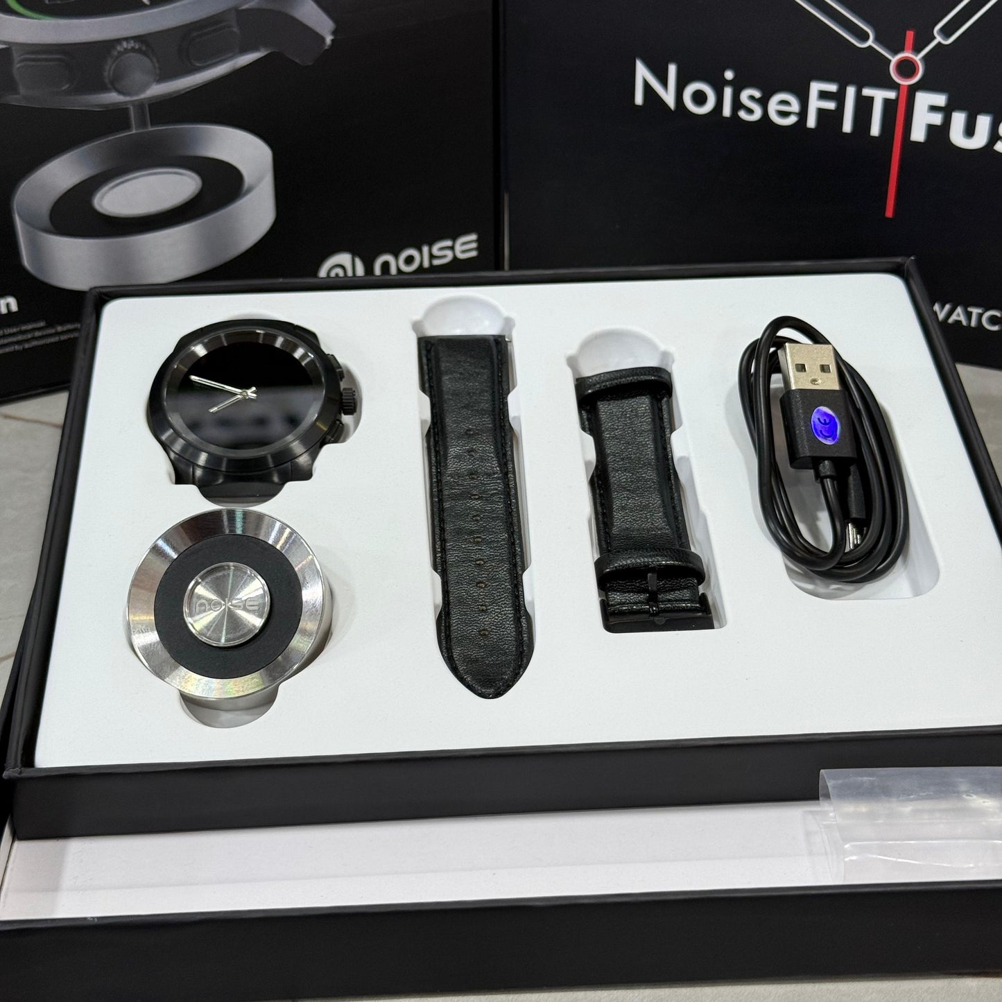 NoiseFIT Fusion Hybrid Smartwatch – Smart & Analog Dual Mode | Premium Leather Strap | Waterproof , Magnetic Charger – Black